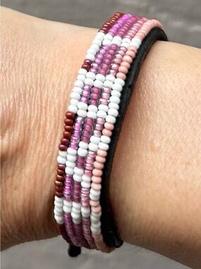NWOT Love is Project Handmade Pink Beaded ‘Love” Bracelet